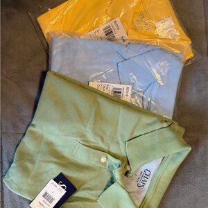 Boys size 7 Polo Shirt Trio in Green, Blue, and Yellow. Brand new with tags.